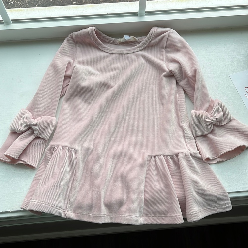 Soft pink dress with bows on sleeves. Size 24 mos.